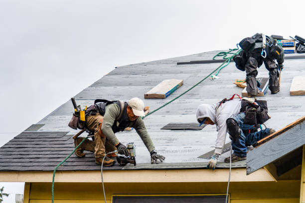 Professional Storm Damage Roof Repair technician working in Morrow, OH